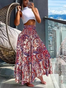 Boho wijde broek met paisley print in rood en blauw en een hoge gesmokte taille