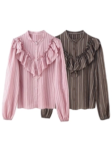 Detail of striped long-sleeve shirts with ruffles in pink and brown color options