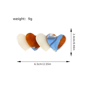 Elegant acetate heart-shaped color-block hair clip with premium marble texture