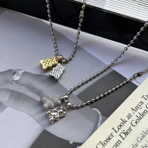 Titanium steel chain necklace featuring micro-pave zircon bear pendants in mixed finishes