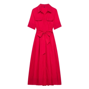 Detail of red short-sleeved shirt dress featuring a lapel collar and waist tie belt
