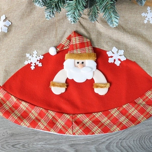 Red Christmas tree skirt with plush Santa Claus applique and plaid borders decor