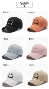 Detail showcasing six colors of cotton baseball caps with embroidered smiley face logos