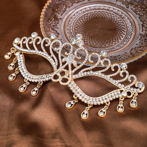 Elegant gold bridal masquerade mask with sparkling rhinestones and crystal teardrop tassels