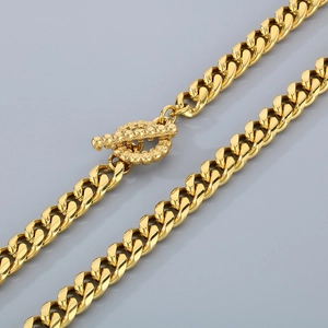 Chunky gold Cuban link chain necklace with stylish toggle clasp for a modern look