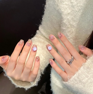 Pink blush cat-eye press-on nails with luxury rhinestones and glitter crystals