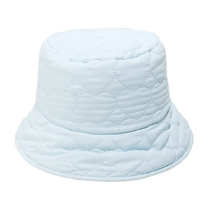 Detail of light blue quilted bucket hat with heart pattern stitching and soft texture