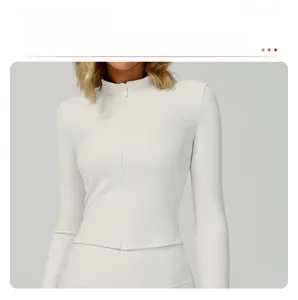 Detail of ribbed slim fit yoga jacket with stand collar and sleek full zipper closure
