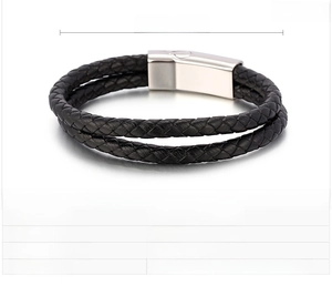 Detail view of double-layer braided leather bracelet with stainless steel magnetic clasp