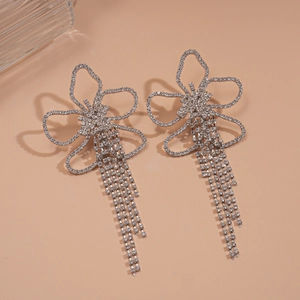 Luxurious silver flower earrings with long rhinestone tassels and sparkling crystals