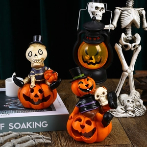 Luminous Halloween skull and pumpkin figures set for festive party decoration with LED light