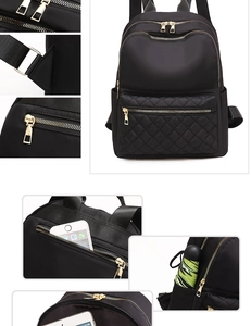 Detalle de mochila Oxford negra mostrando tela impermeable y cremalleras doradas