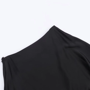 Women's black asymmetrical lace top featuring a sleek invisible zipper and modern diagonal seams