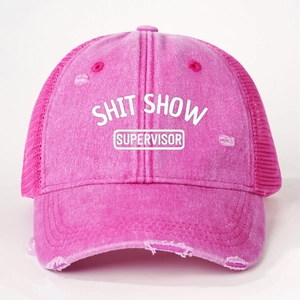 Detail of hot pink distressed trucker hat with SHIT SHOW SUPERVISOR print and mesh back