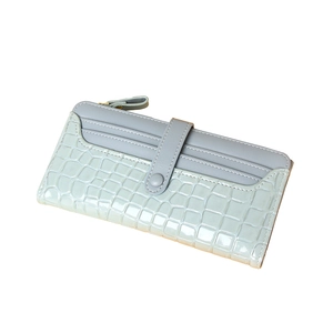 Women long wallet in light blue embossed crocodile leather with multi-card slots