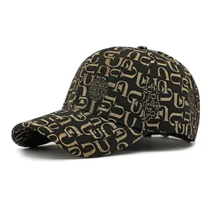 Classic black and gold monogram baseball cap with a luxury jacquard fabric finish