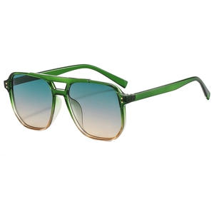 Fashionable oversized double bridge sunglasses with green frames and gradient blue lenses