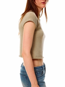 Detail of oatmeal knit cropped tee featuring roll edge hem and fine texture on sleeve