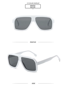 Macro detail of retro square sunglasses with thick white frames and dark lenses