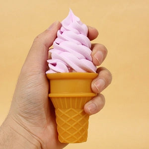 Scented purple swirl cream ice cream cone prop with yellow grid waffle cone texture