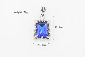 Detailed view of silver dragon claw pendant with blue gemstone and measurement specs