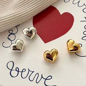 Minimalist 925 silver 3D heart stud earrings in polished gold and silver finishes