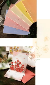 Detail showing 3D pop-up floral design and matching envelopes for greeting cards