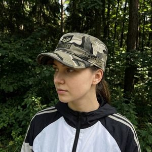 Men's camouflage cadet cap with Air Force embroidery shown in an outdoor forest setting
