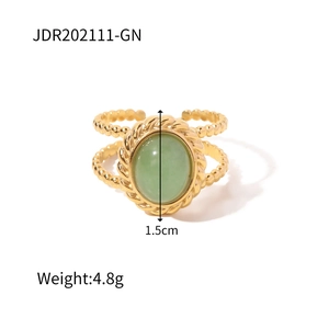 Detailed view of vintage gold ring with green oval stone and beaded band, weight 4.8g