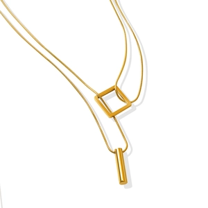 Minimalist double-layer gold snake chain necklace with square and cylinder pendants