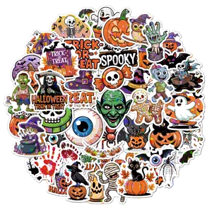 Detailed pile of assorted laser Halloween stickers featuring pumpkins, ghosts, and bats