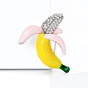 Cute banana brooch pin featuring yellow enamel with pink skin and sparkling rhinestones