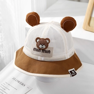 Detail of baby sun hat featuring breathable white mesh, bear ears, and cute embroidery