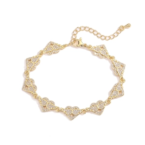Golden heart bracelet with sparkling zircon wings and adjustable link chain extender