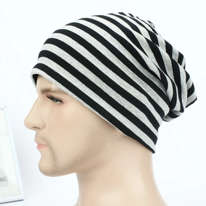 Detail of soft striped knit fabric and texture on the breathable slouchy beanie hat