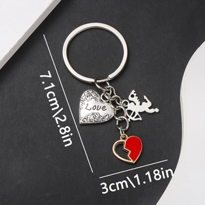 Detail view of zinc alloy keychain featuring Love heart, Cupid, and red broken heart charm