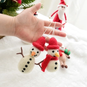 Handmade wool felt snowman Christmas tree ornaments with red hats for holiday decoration