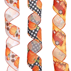 Detail showing faux linen ribbons with pumpkins and maple leaves for autumn decor