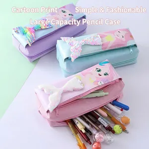 Three mermaid pencil cases in pastel purple, blue and pink with sequined fish tail bows