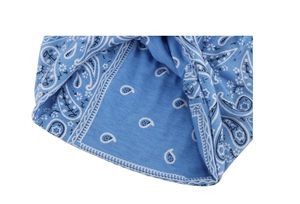 Close-up of blue paisley pattern on soft cotton fabric with durable stitching detail