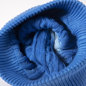 Blue tie-dye knit beanie with cable texture and warm ribbed cuff for winter outdoor