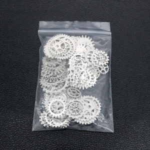 Detailed view of silver steampunk alloy gears and cogs for DIY crystal epoxy resin crafts