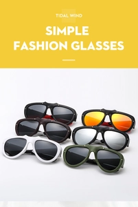 Collection of oversized fashion sunglasses in various colors including black, white and orange