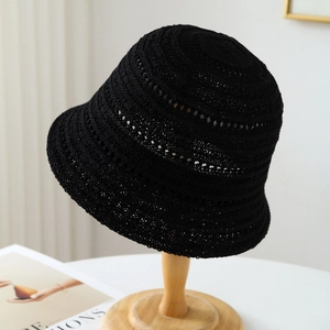 Retro black crochet bucket hat for women with a breathable hollow-out woven pattern