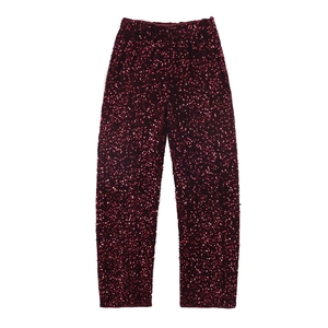 Détails d'un pantalon femme bordeaux à paillettes avec une taille élastique souple