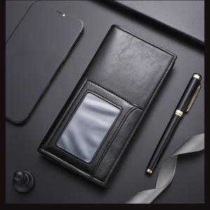 Close-up of black leather long wallet featuring multi-functional card slots and ID window
