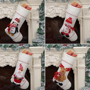 Set of 4 knitted Christmas stockings featuring 3D Santa, Snowman, Reindeer, and Penguin characters