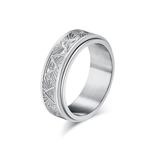 Titanium spinner ring featuring Ancient Egyptian Eye of Horus engraved patterns