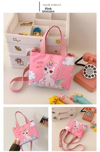 Front view of pink cartoon unicorn crossbody bag for kids with handles and strap