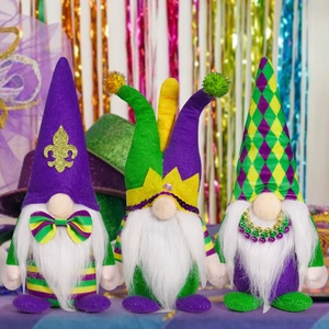 Three Mardi Gras gnomes with fleur-de-lis and crown decorations in purple green and gold